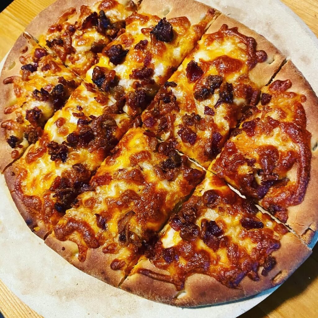 11 Trendy Neapolitan Pizza Flavors To Try At Home 11 A delicious pizza topped with smoky bacon and cheddar cheese.