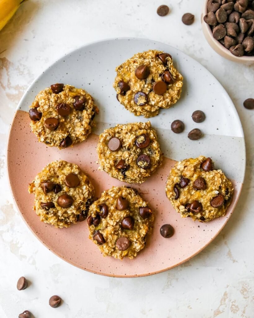 Freshly baked banana oatmeal cookies on a cooling rack
