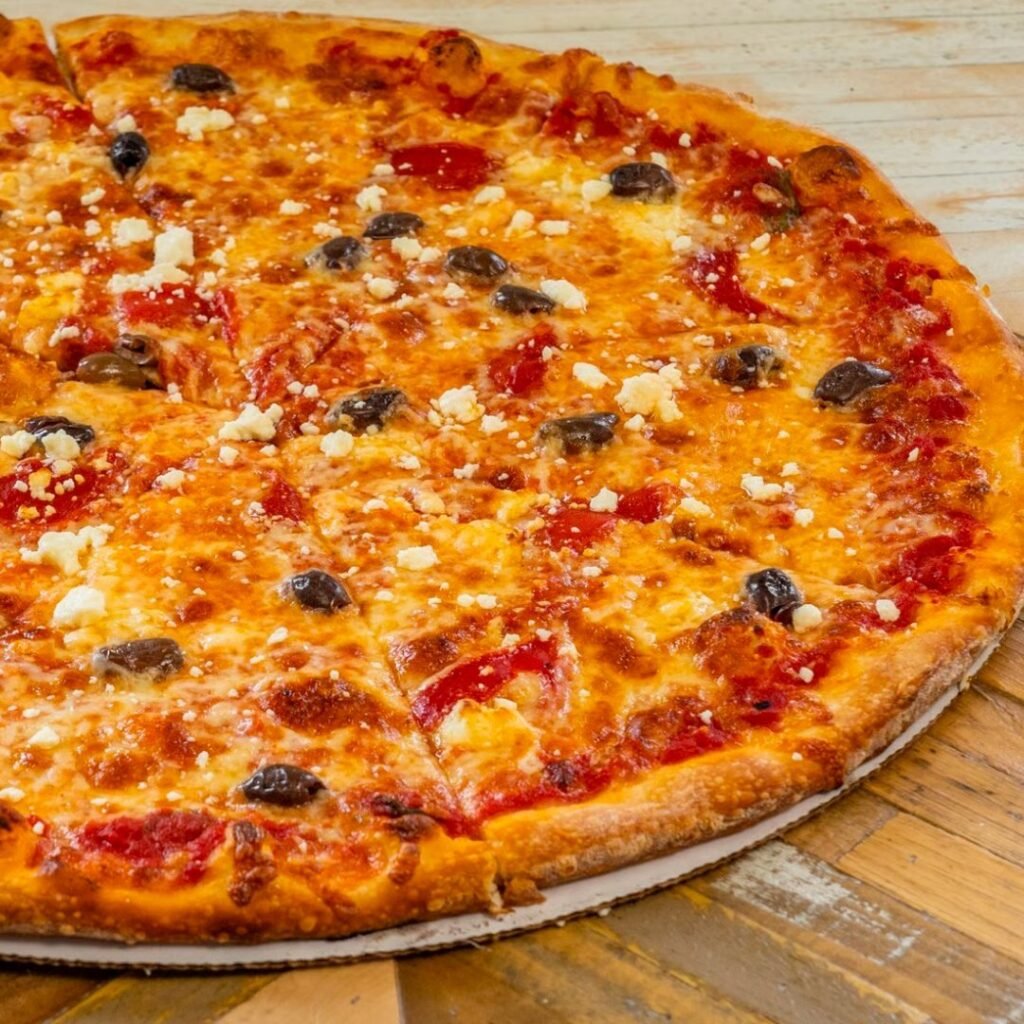 13 Easy And Delicious Grandma Pizza Recipes You Need To Try 6 Mediterranean Veggie Grandma Pizza topped with olives, feta cheese, and fresh basil.