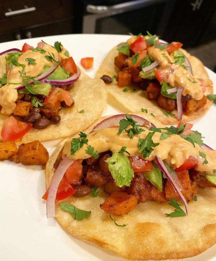 Sweet potato and black bean tacos with cilantro and lime