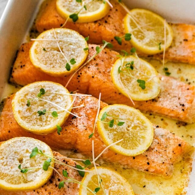 Baked salmon with dill and lemon served with asparagus