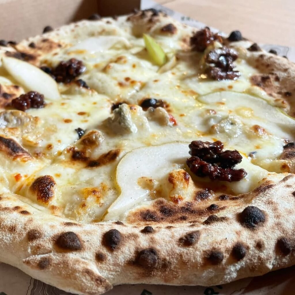 Gourmet Pear and Gorgonzola pizza with fresh ingredients