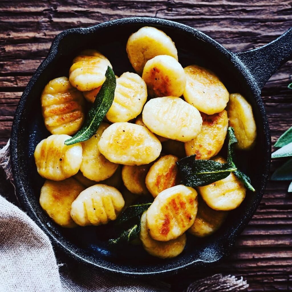 10 Irresistible Gnocchi Dinner Recipes You Must Try 3 A bowl of gnocchi garnished with fresh sage leaves