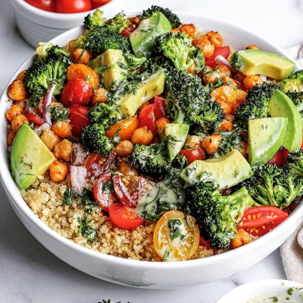 A bowl of colorful quinoa salad with lemon and herbs