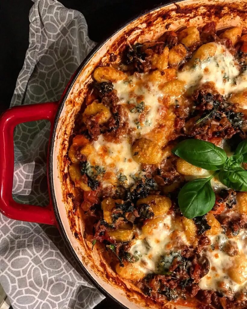 10 Irresistible Gnocchi Dinner Recipes You Must Try 9 A delicious Bolognese Gnocchi Bake topped with cheese and herbs.